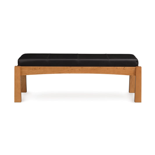 Copeland Furniture Berkeley Upholstered Bench with black cushioned seat and cherry wood frame, showcasing its sleek design.