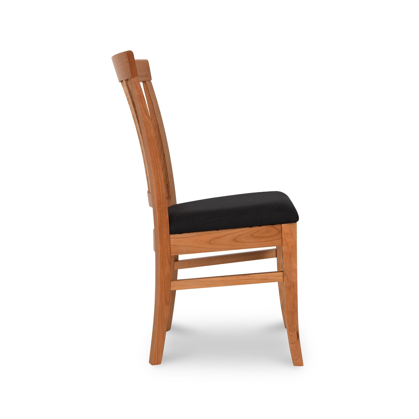 Bistro Dining Chair by Lyndon Furniture, Vermont-made, elegant side view highlighting black cushioned seat and slatted backrest.