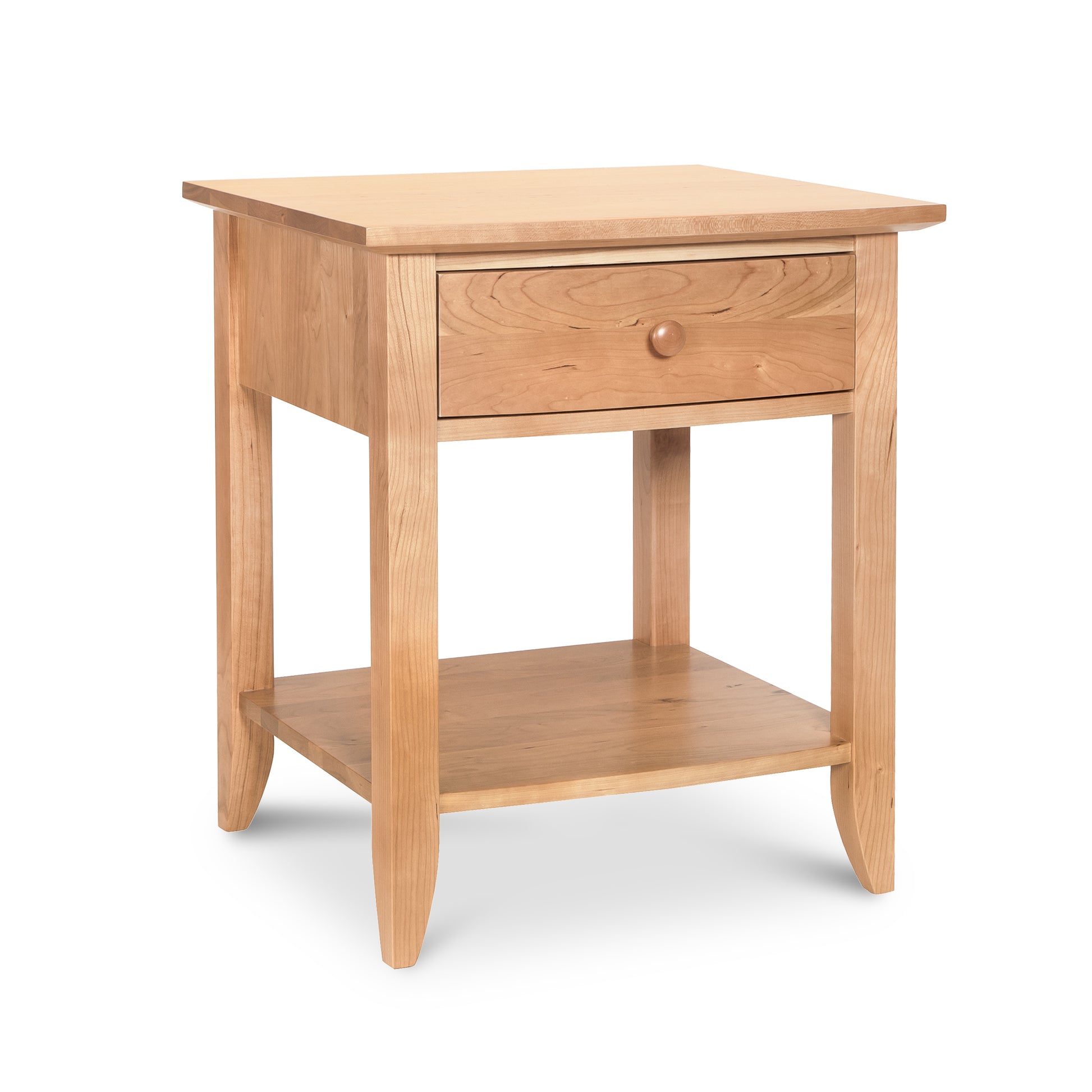 A Lyndon Furniture Bow Front 1-Drawer Open Shelf Nightstand with a drawer on top.