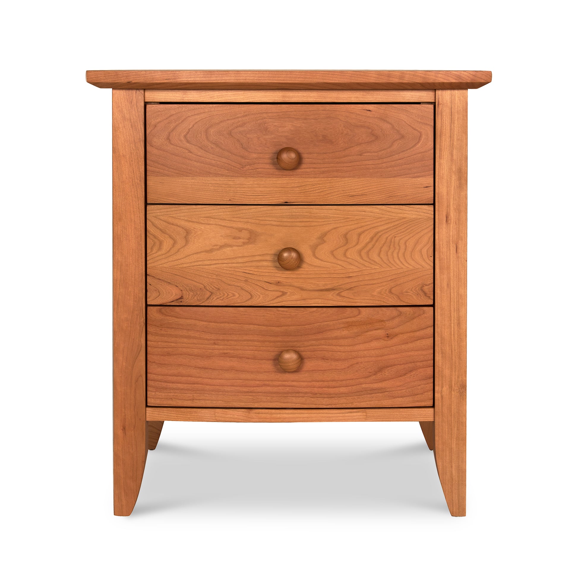 A Bow Front 3-Drawer Nightstand by Lyndon Furniture, with three drawers.