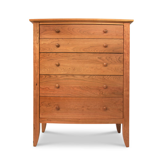 Lyndon Furniture Bow Front 5-Drawer Chest in solid wood with round knobs, showcasing elegant craftsmanship and smooth bow front design.