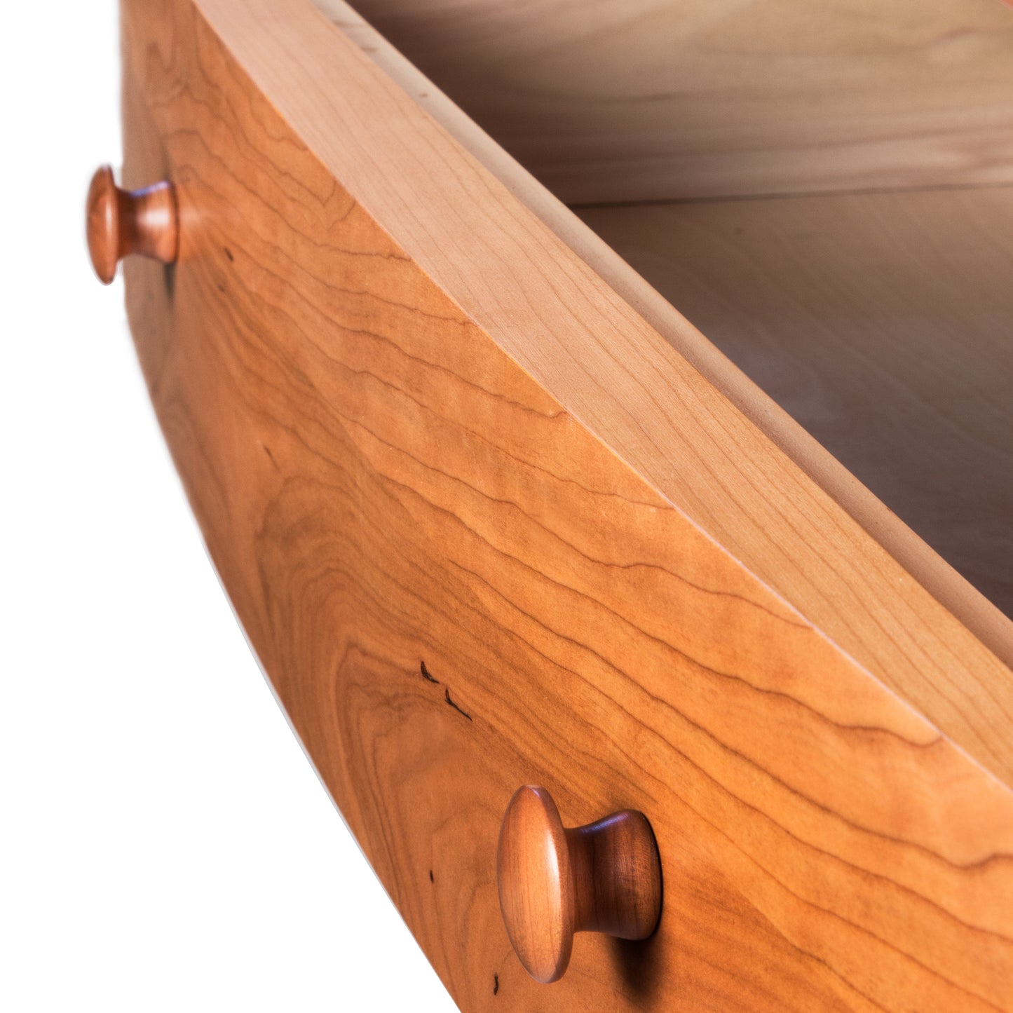Bow Front 5-Drawer Chest by Lyndon Furniture, crafted from solid hardwood with a natural finish and round knobs, highlighting fine American-made craftsmanship.