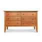 A high-quality Bow Front 6-Drawer Dresser by Lyndon Furniture with drawers on a white background.