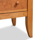 A close up of the Lyndon Furniture Bow Front 6-Drawer Dresser.