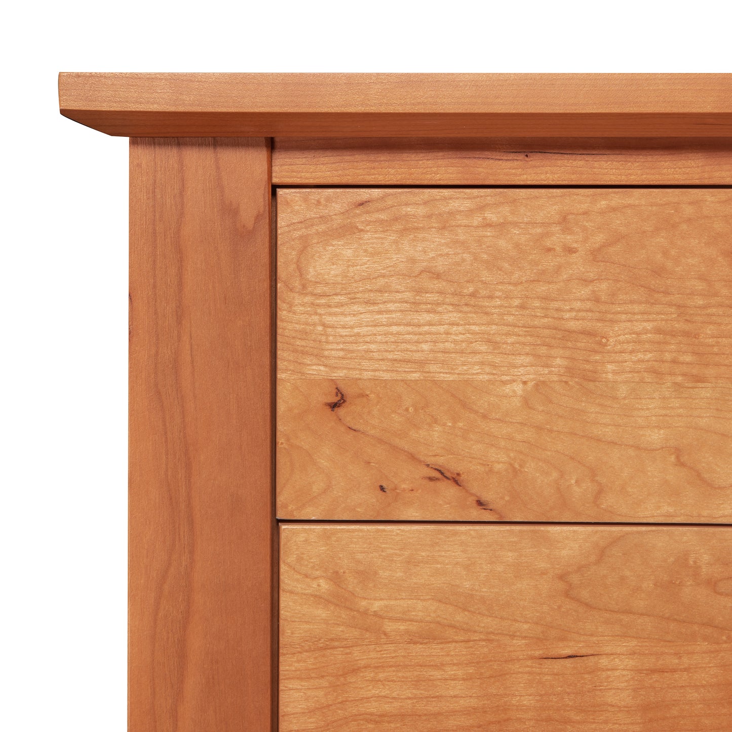 A close up of a Lyndon Furniture Bow Front 8-Drawer Dresser, also known as a bureau.