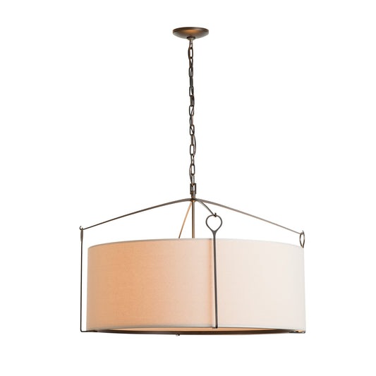 A handmade Hubbardton Forge Bow Large Pendant light fixture with a white shade hanging from a chain.