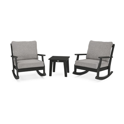 Two modern POLYWOOD Braxton Deep Seating Rockers in gray with cushions and a matching black side table, displayed on a white background.