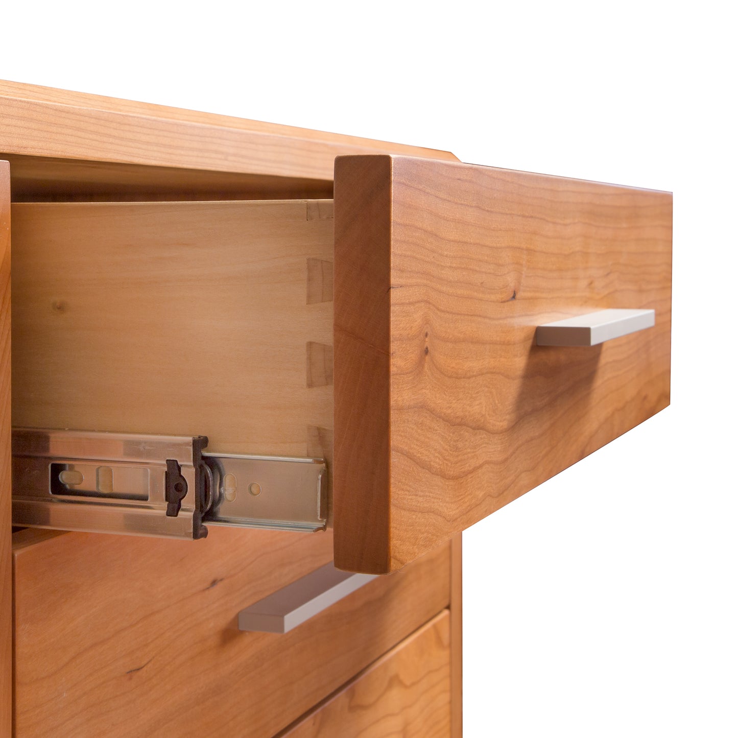 Brighton Buffet by Lyndon Furniture featuring a partially open wooden drawer with dovetail joints and a sleek modern silver handle.
