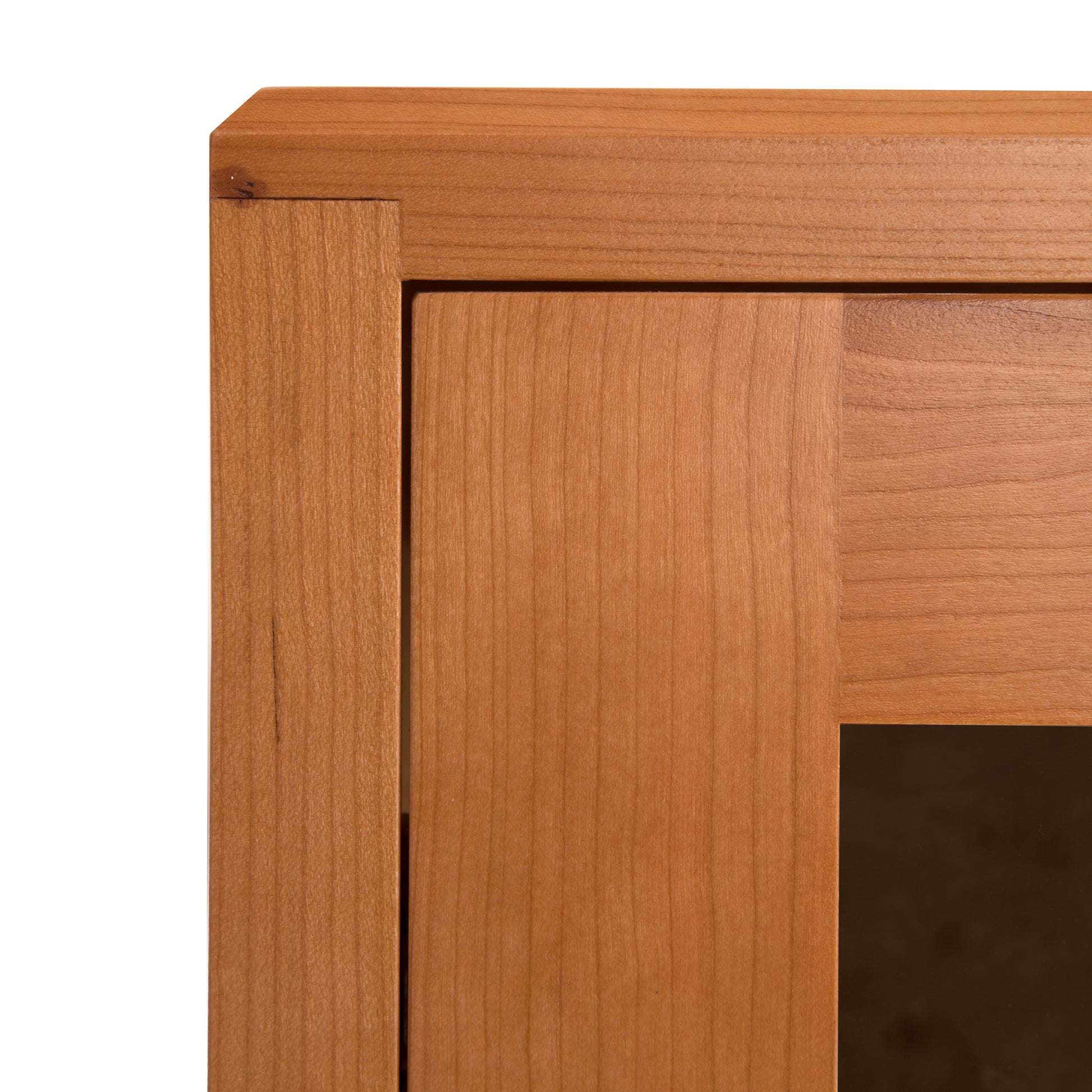 Close-up of the Brighton Buffet by Lyndon Furniture highlighting its smooth corner joint and rich natural wood grain craftsmanship.