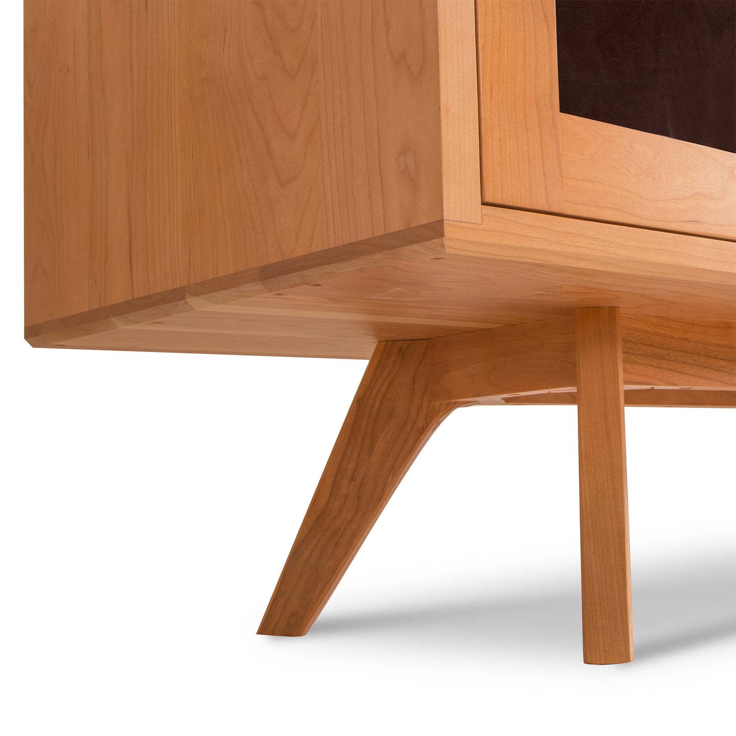 Lyndon Furniture Brighton Buffet featuring angled wooden legs and mid-century design, highlighting its craftsmanship and elegant wood finish.