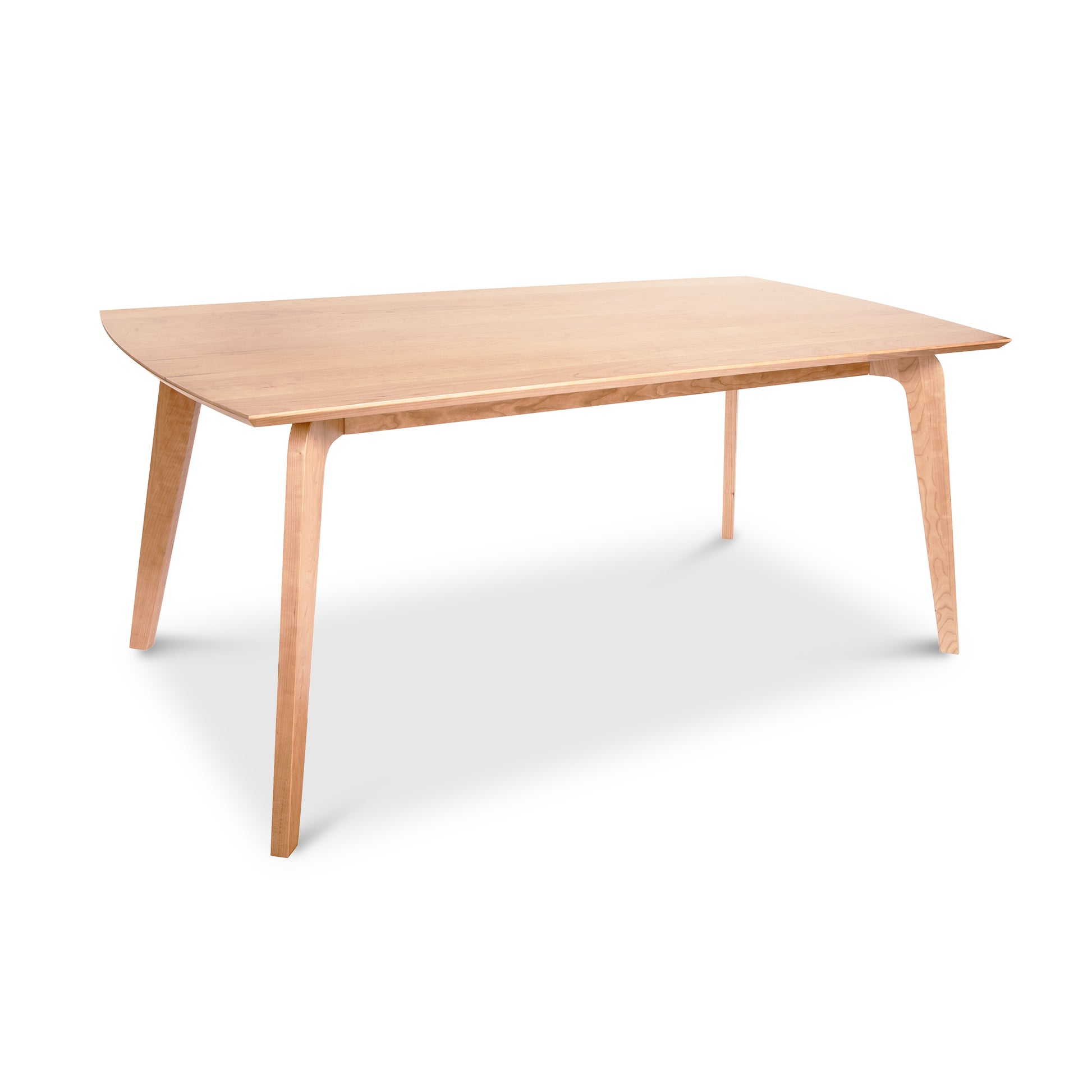 Brighton Solid-Top Table by Lyndon Furniture with angled legs and light finish, showcasing mid-century modern design.