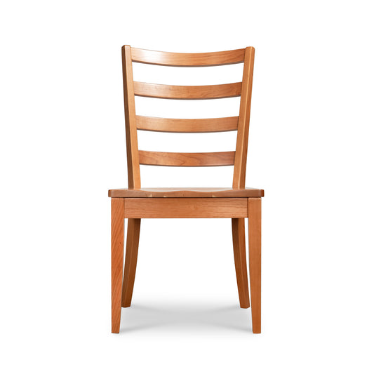 Bromley Ladder-Back Chair by Vermont Woods Studios, American-made with solid wood seat and straight legs, front view highlighting chair’s craftsmanship.