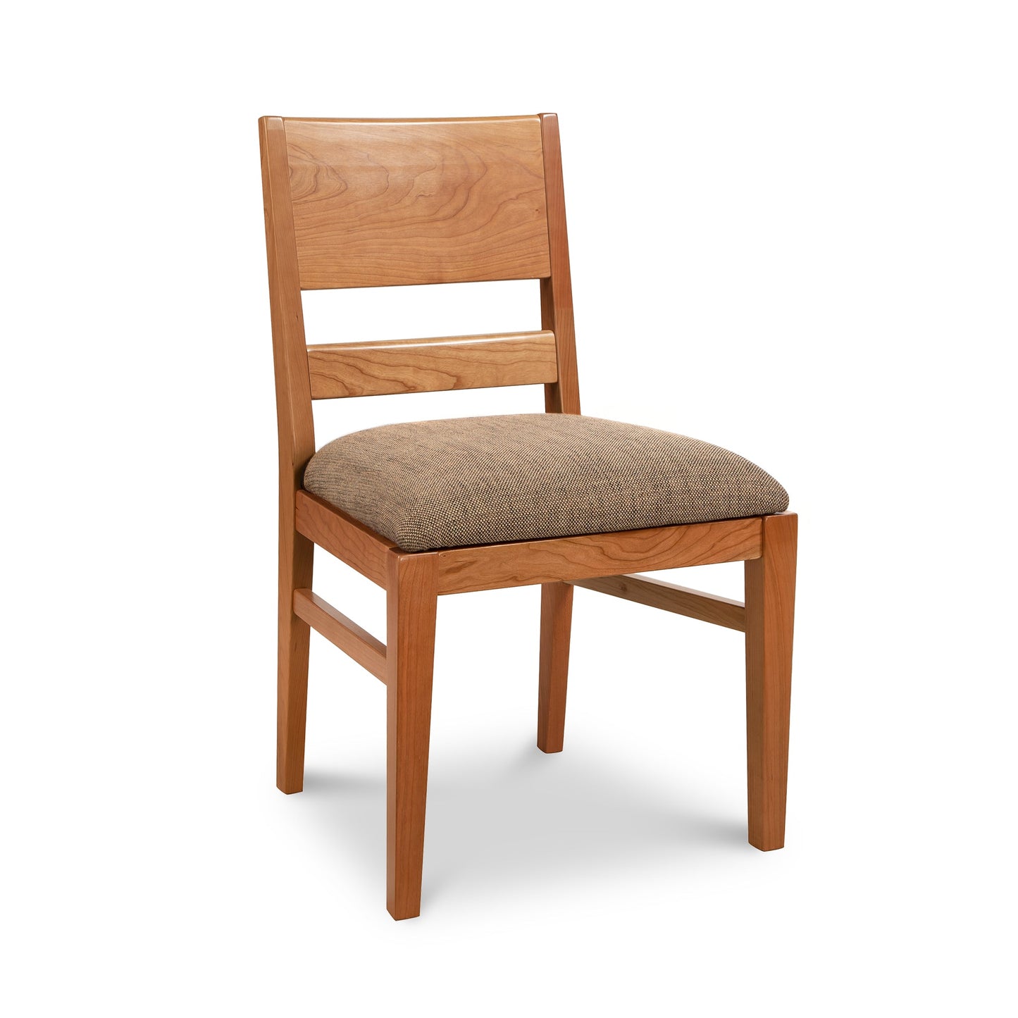 A wooden dining chair with a tan upholstered seat.