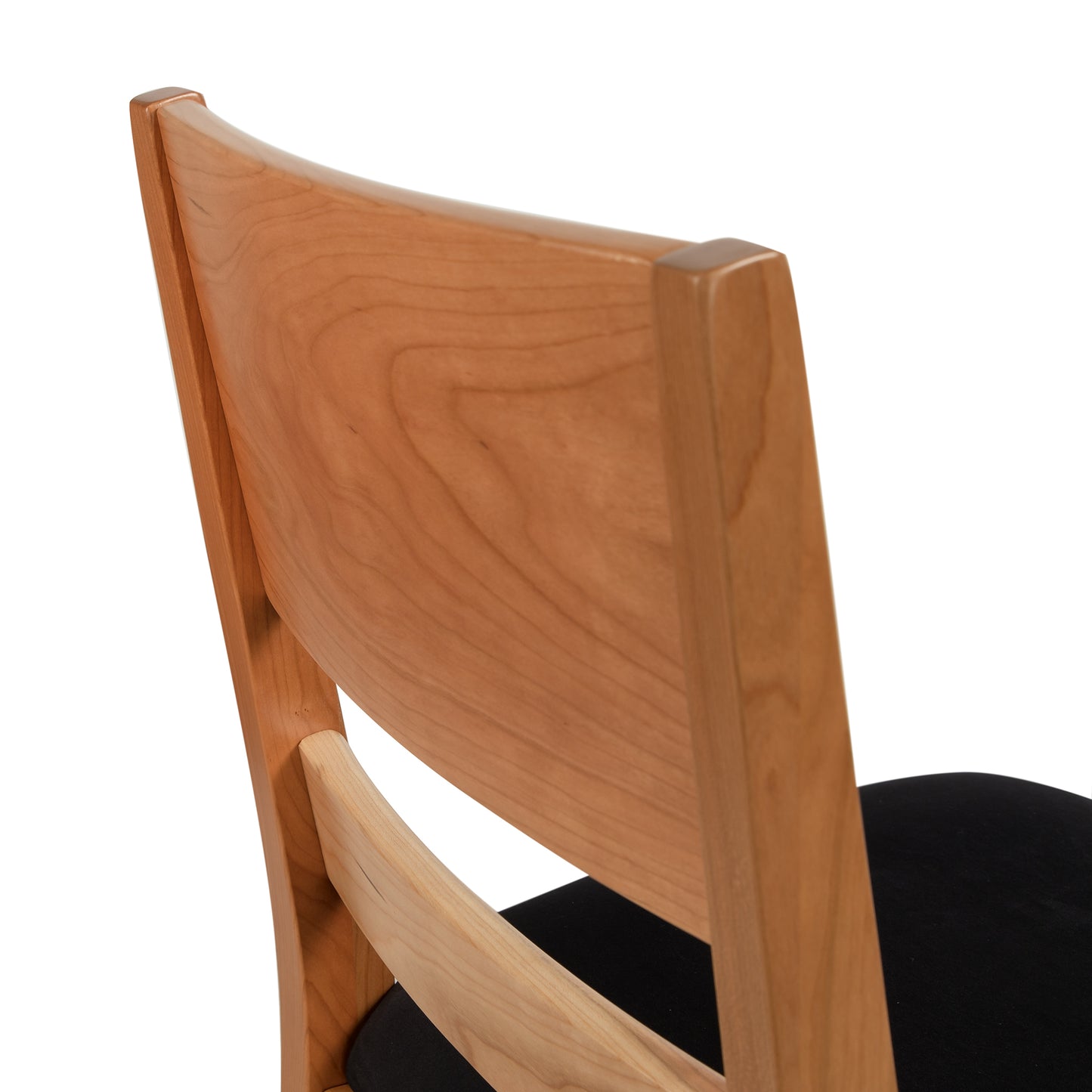 Burke Modern Chair 4-Piece Set showcasing natural wood frames and black cushions, highlighting contemporary American craftsmanship.