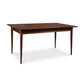 Craftsmanship: The Vermont Woods Studios Burke Modern Dining Table with a solid wood top and legs.