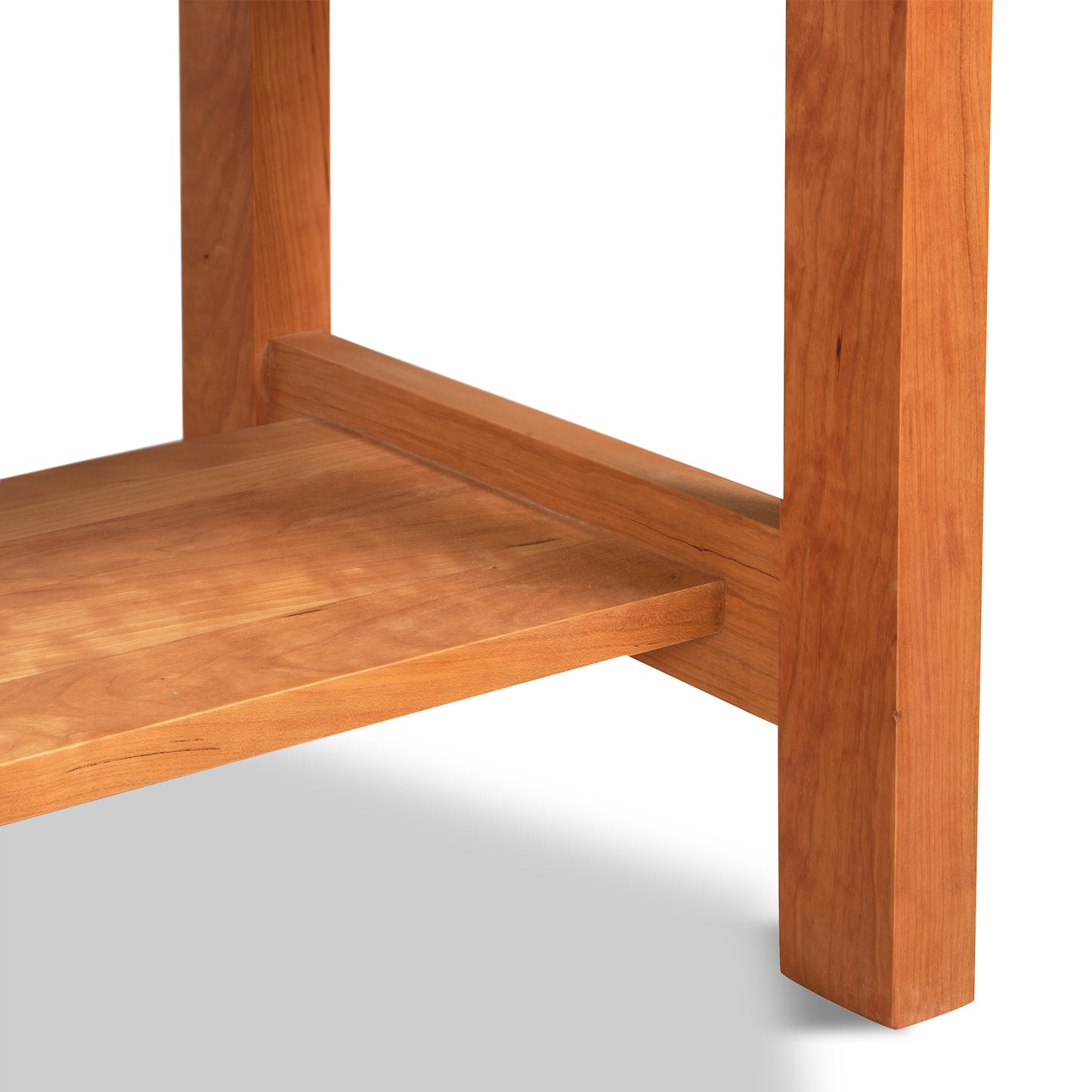 Burlington Shaker 2-Drawer Coffee Table in solid cherry wood, highlighting drawers, sturdy legs, and lower shelf by Vermont Furniture Designs.