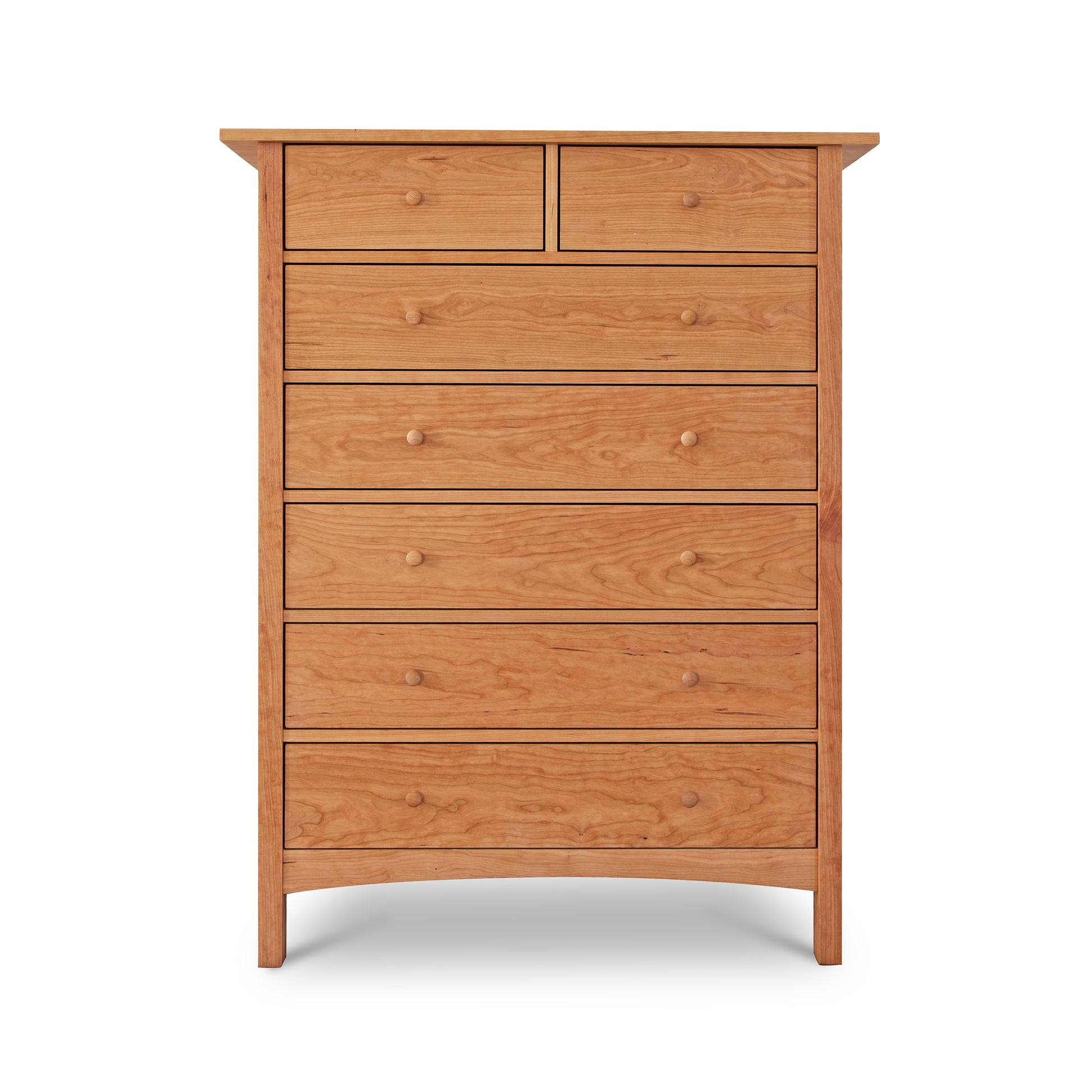 A solid wood Vermont Furniture Designs Burlington Shaker 7-Drawer Chest with round knobs, isolated on a white background.