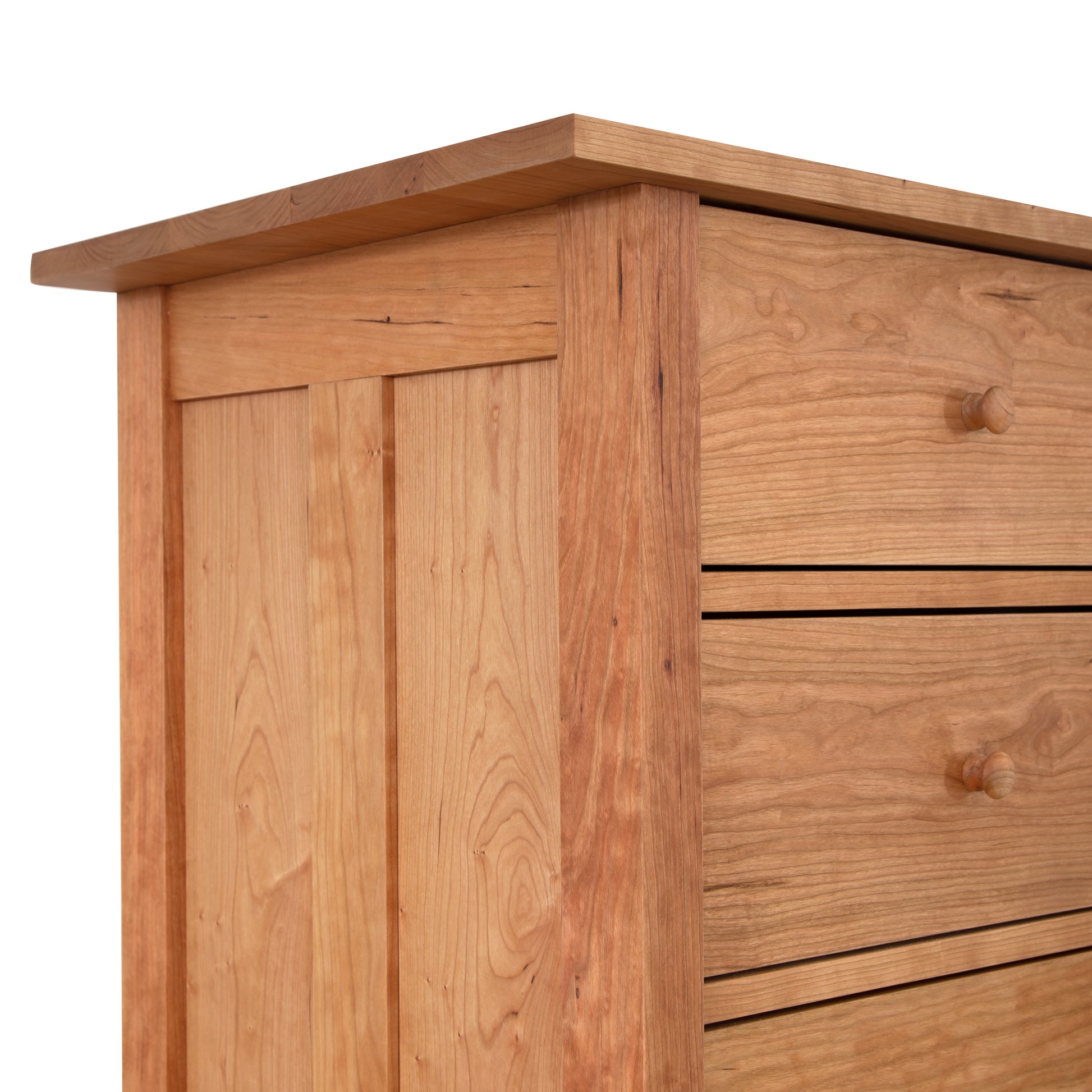 Burlington Shaker 7-Drawer Chest by Vermont Furniture Designs, highlighting natural wood craftsmanship and round drawer knobs.
