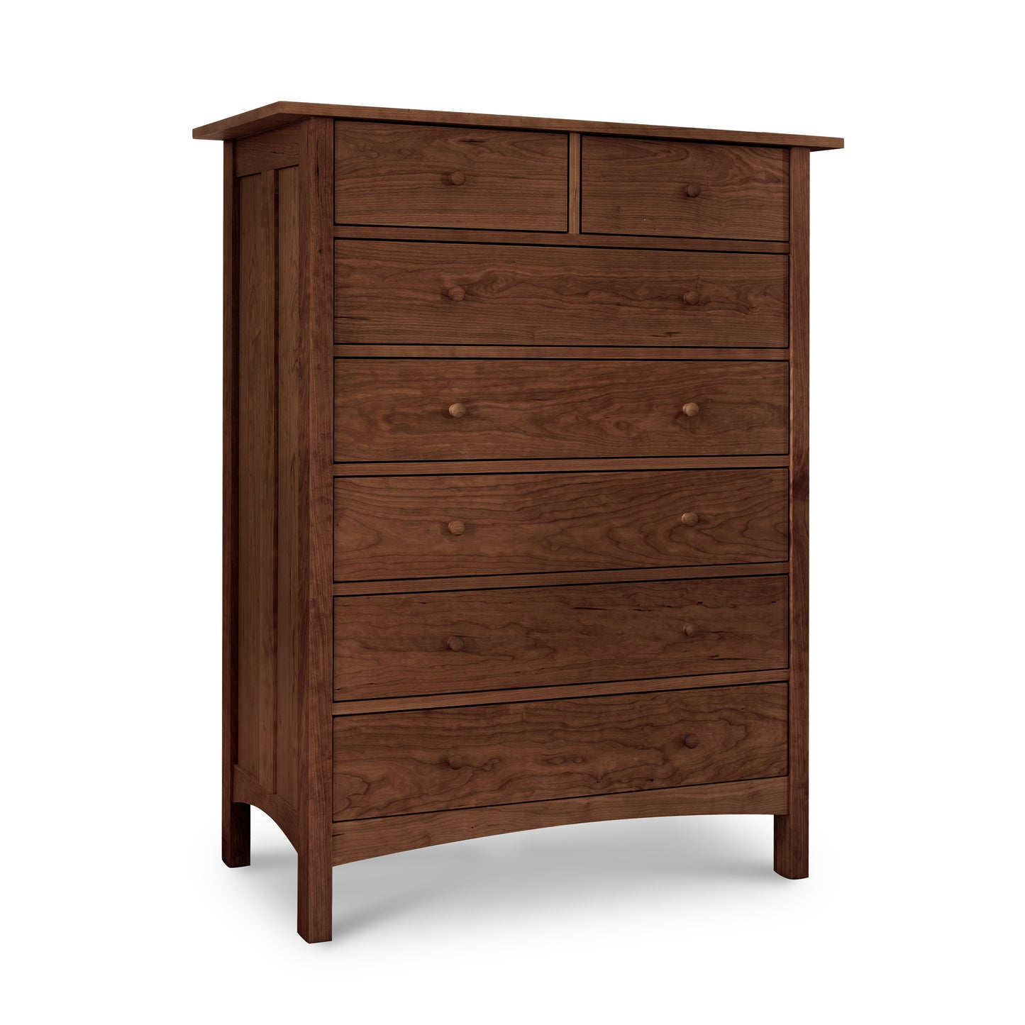 The Heartwood Shaker 7-Drawer Chest by Vermont Furniture Designs, crafted in solid wood with round knobs, shown as a premium American-made bedroom piece.