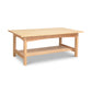 A Vermont Furniture Designs Burlington Shaker Coffee Table with a lower shelf, isolated on a white background.
