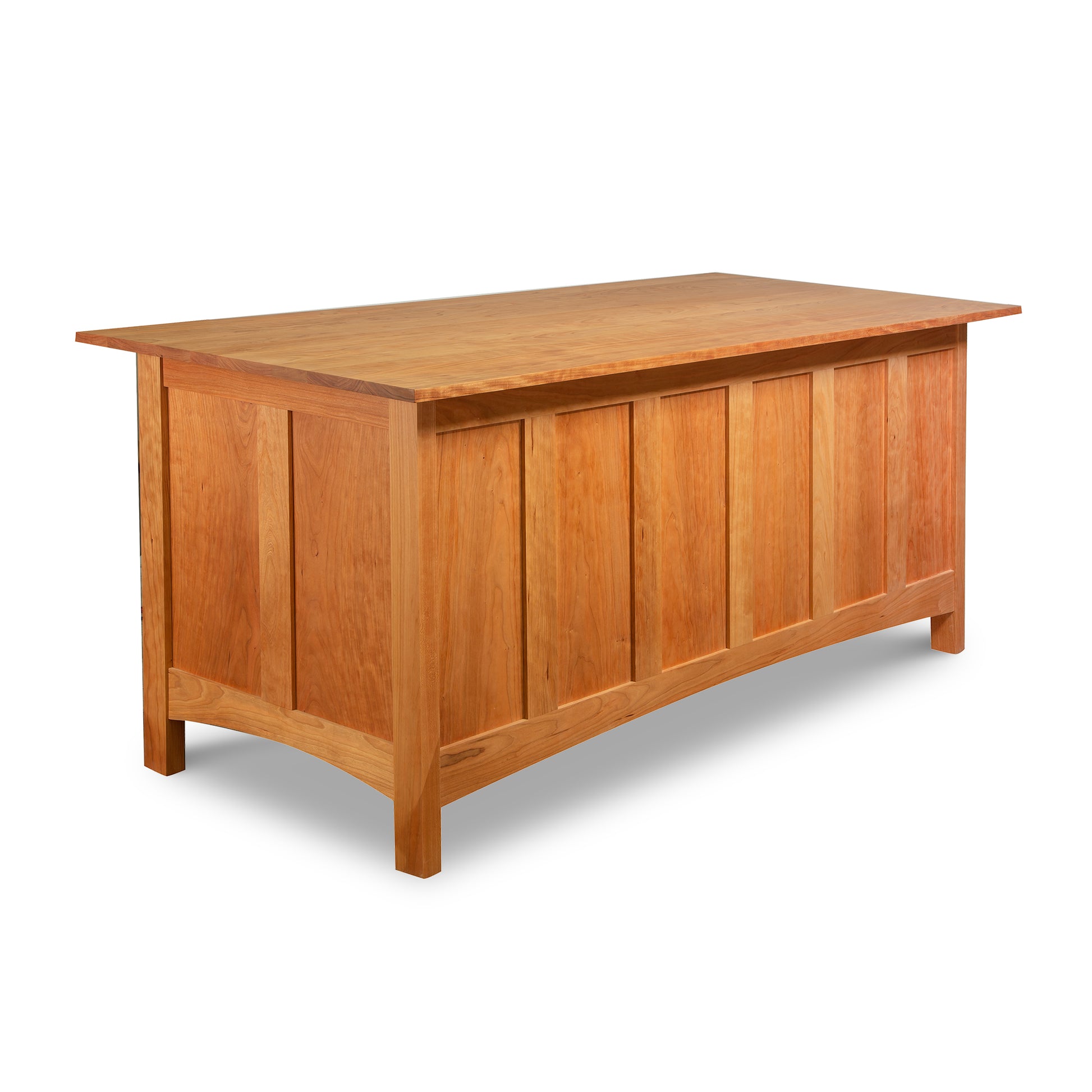 Burlington Shaker Executive Desk by Vermont Furniture Designs crafted from solid wood with a rectangular top and paneled sides, elegantly finished in light brown.