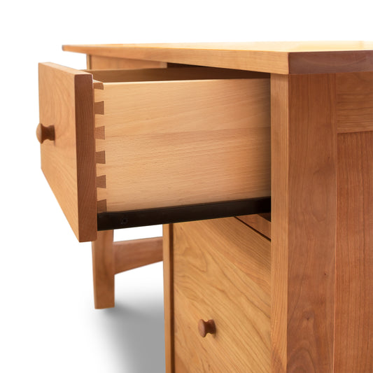 Burlington Shaker Study Desk by Vermont Furniture Designs with open dovetail drawer and rich wood grain, showcasing high quality craftsmanship.