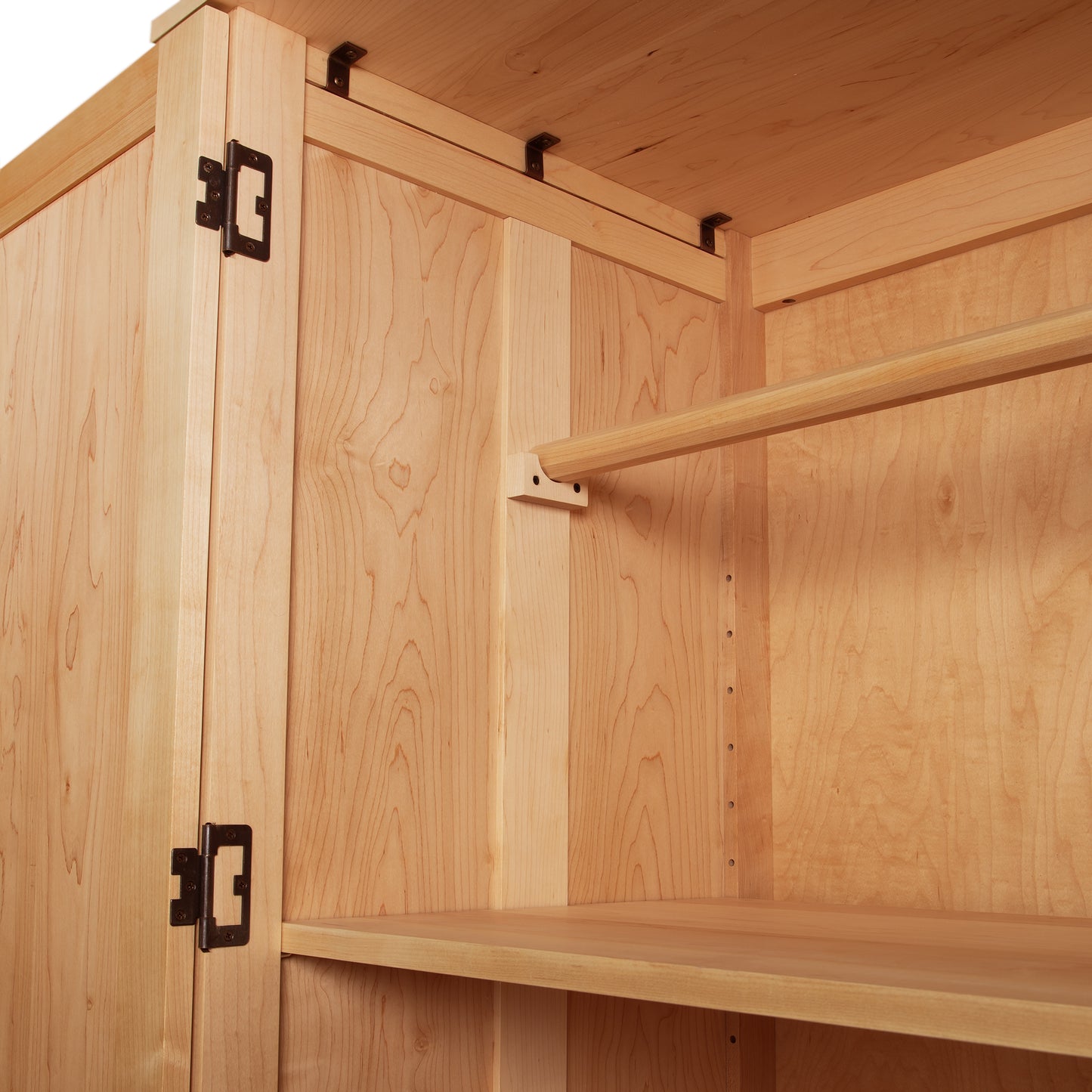 Burlington Shaker Tall Armoire featuring natural wood grain, hanging rod, shelves, and metal hinges by Vermont Furniture Designs.
