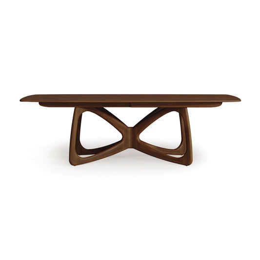Butterfly Extension Dining Table in walnut by Copeland Furniture, featuring a sculptural hardwood base. American made, high quality, sustainably sourced.