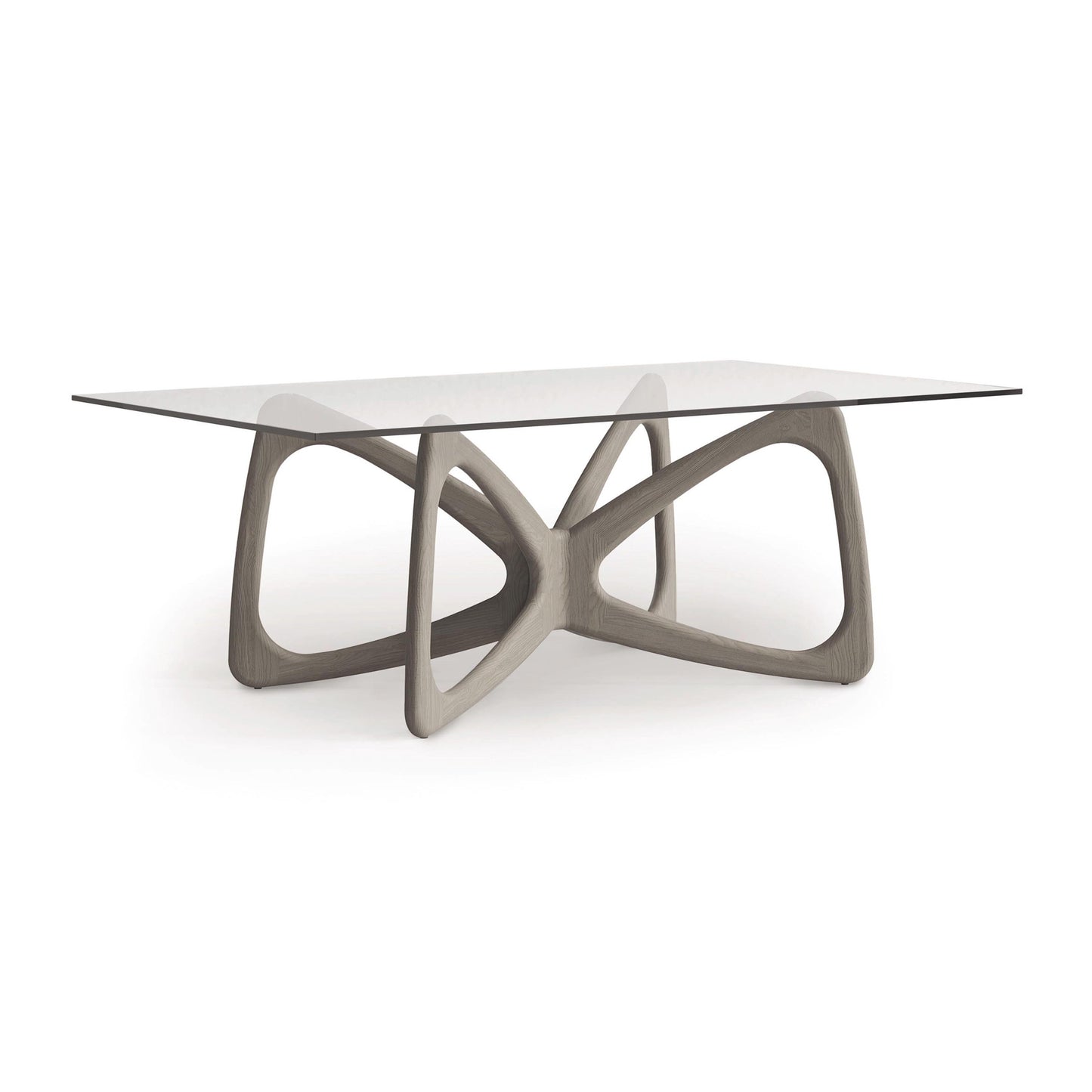 Butterfly Glass Top Dining Table by Copeland Furniture with a tempered glass surface and elegant light wood geometric base, highlighting its modern, sculptural design.