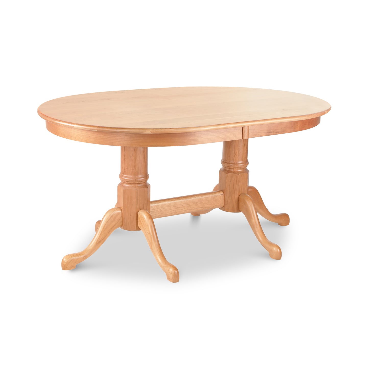 Cabriole Oval Double Pedestal Solid Top Dining Table by Lyndon Furniture, crafted in natural cherry wood.