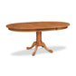 A Lyndon Furniture Cabriole Single Pedestal Round Extension Table with a traditional claw foot base.