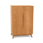 A Copeland Furniture Catalina Bar Cabinet with wine storage and closed doors on a white background.