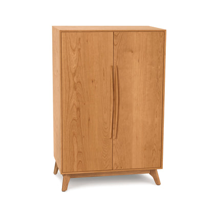 A Copeland Furniture Catalina Bar Cabinet for wine storage, with closed doors on a white background.