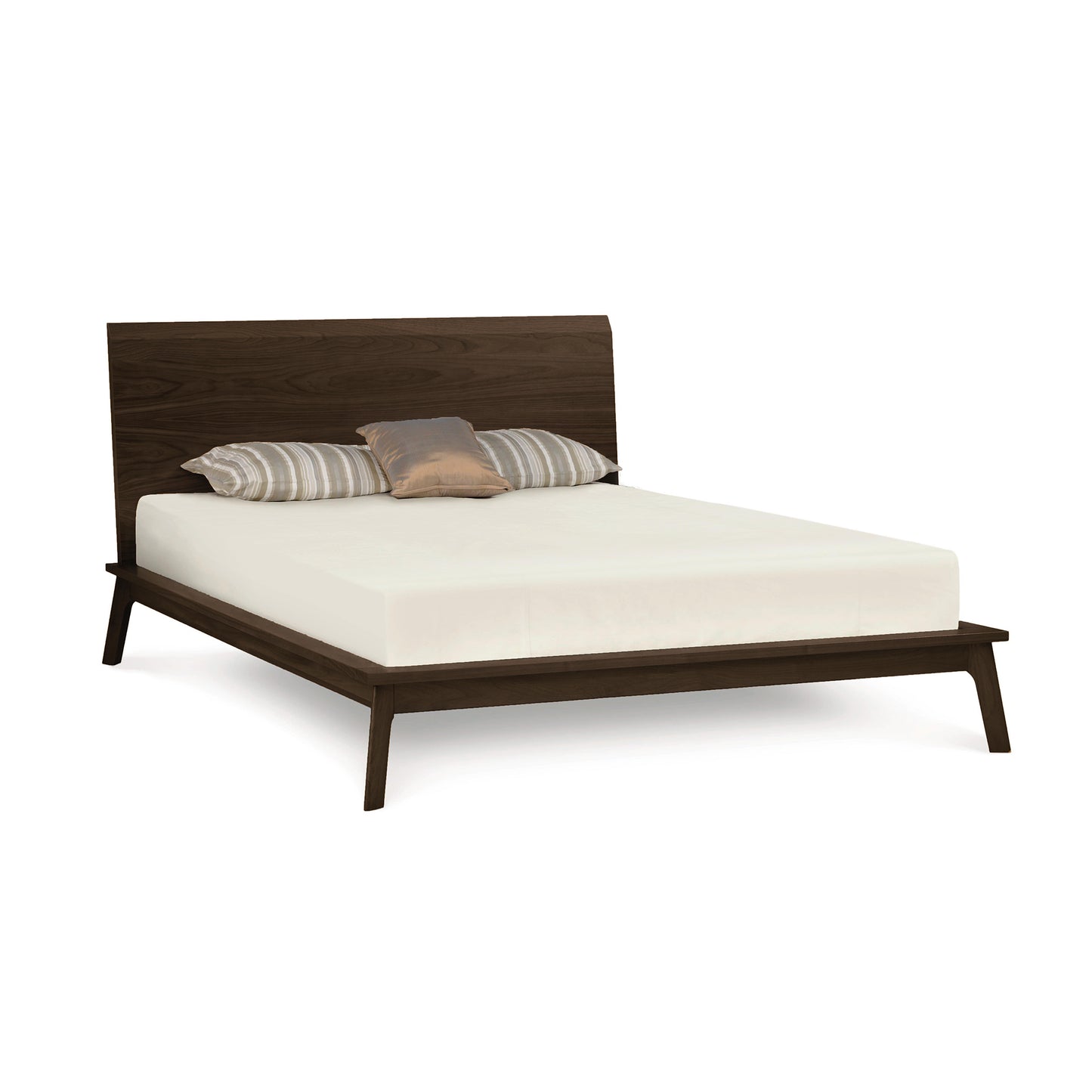 Modern Copeland Furniture Catalina Cherry Platform Bed frame crafted from solid natural cherry hardwood, with a white mattress and three pillows featuring different patterns and sizes.