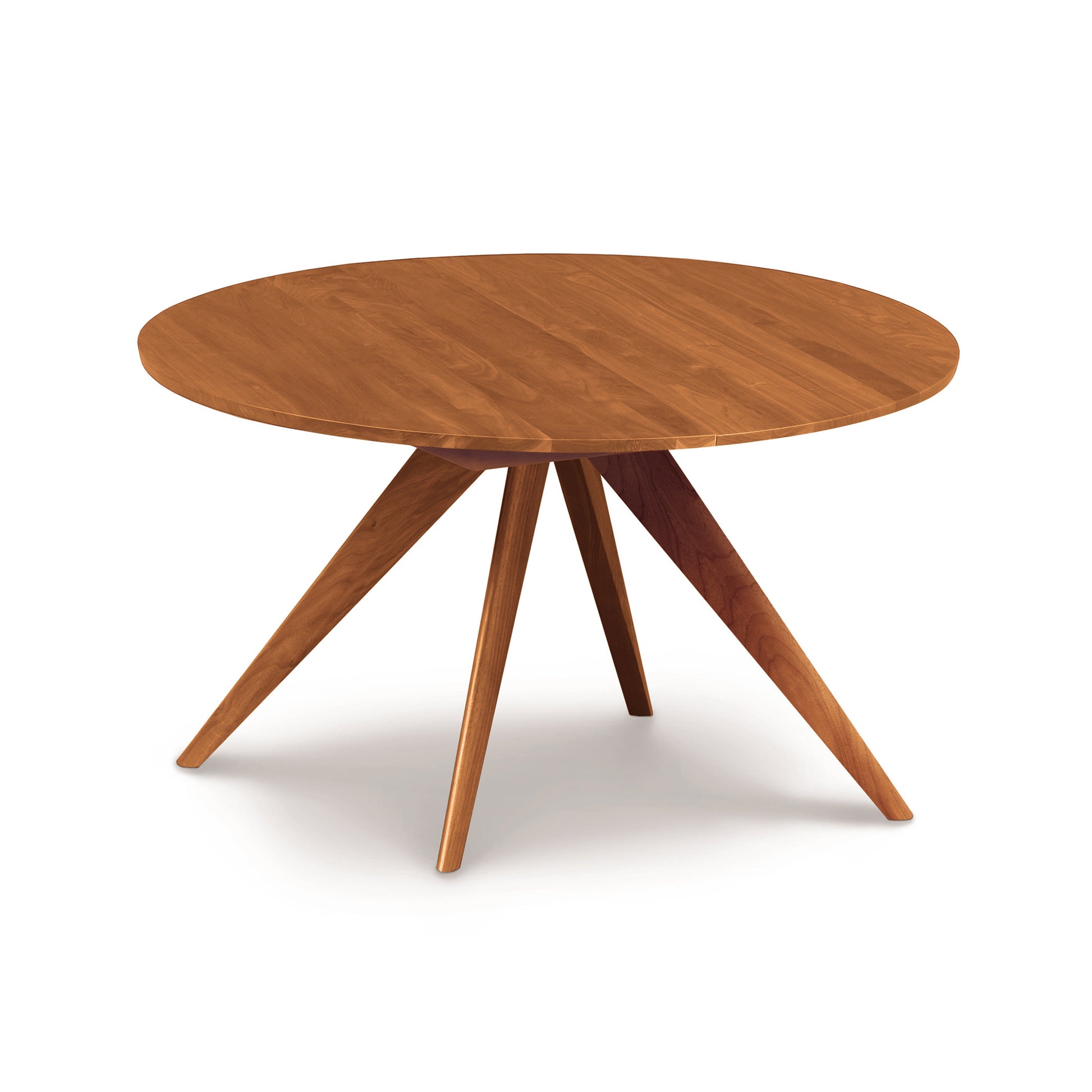 Catalina Round Extension Table by Copeland Furniture, crafted from solid North American wood with a smooth top and four angled legs.