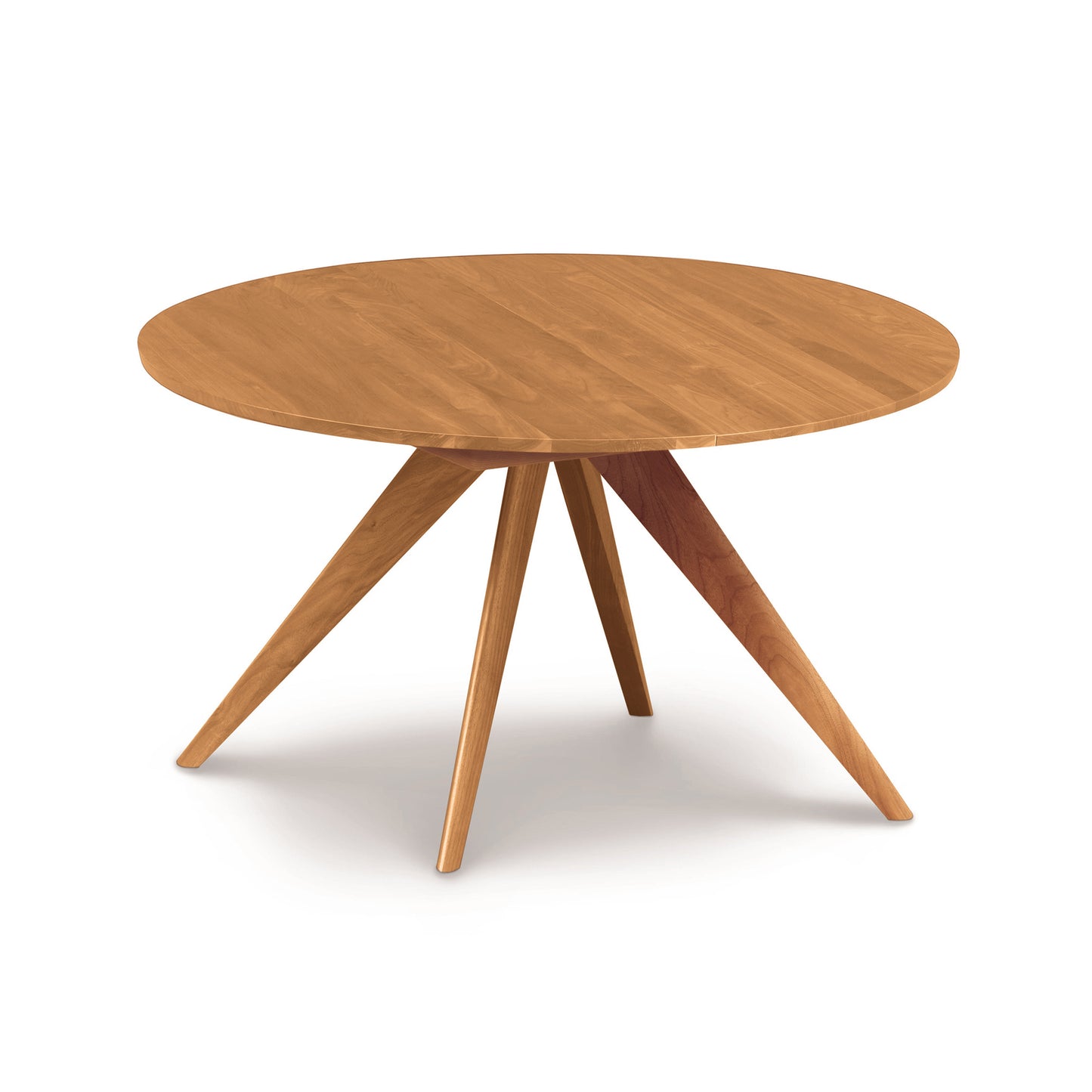 Copeland Catalina Round Extension Table in solid North American wood with a self-storing butterfly leaf, showcasing elegant craftsmanship.