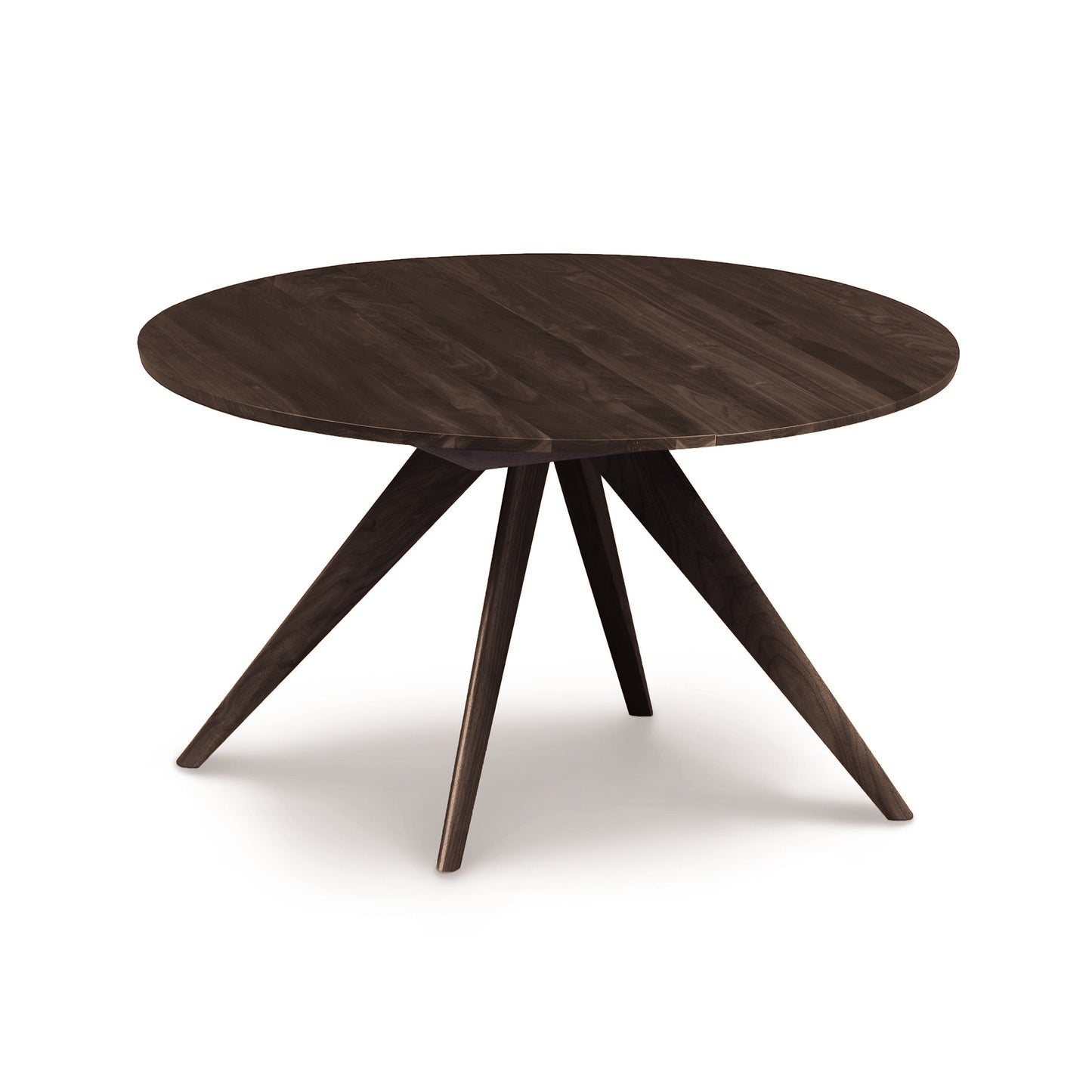 Solid wood Copeland Catalina Round Extension Table with a smooth top and angled legs, highlighting craftsmanship and design.