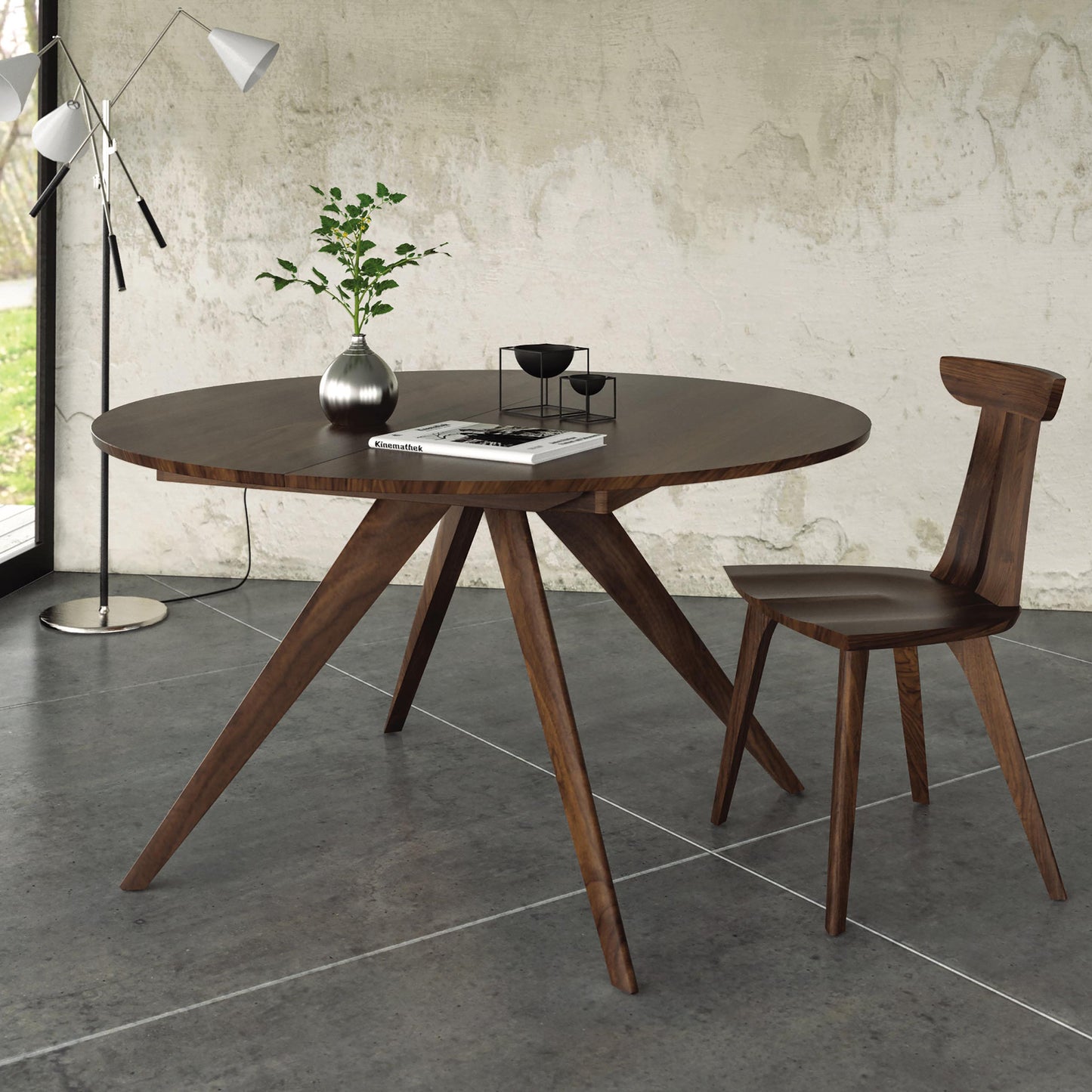 Copeland Furniture Catalina Round Extension Table with matching chair, showcasing elegant hardwood craftsmanship and modern design.