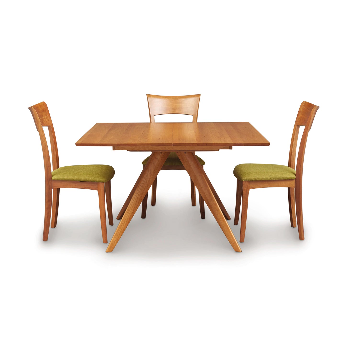 A Copeland Furniture Catalina Square Extension Dining Table with two matching chairs set against a white background. The chairs have green upholstered seats made of sustainably harvested wood.