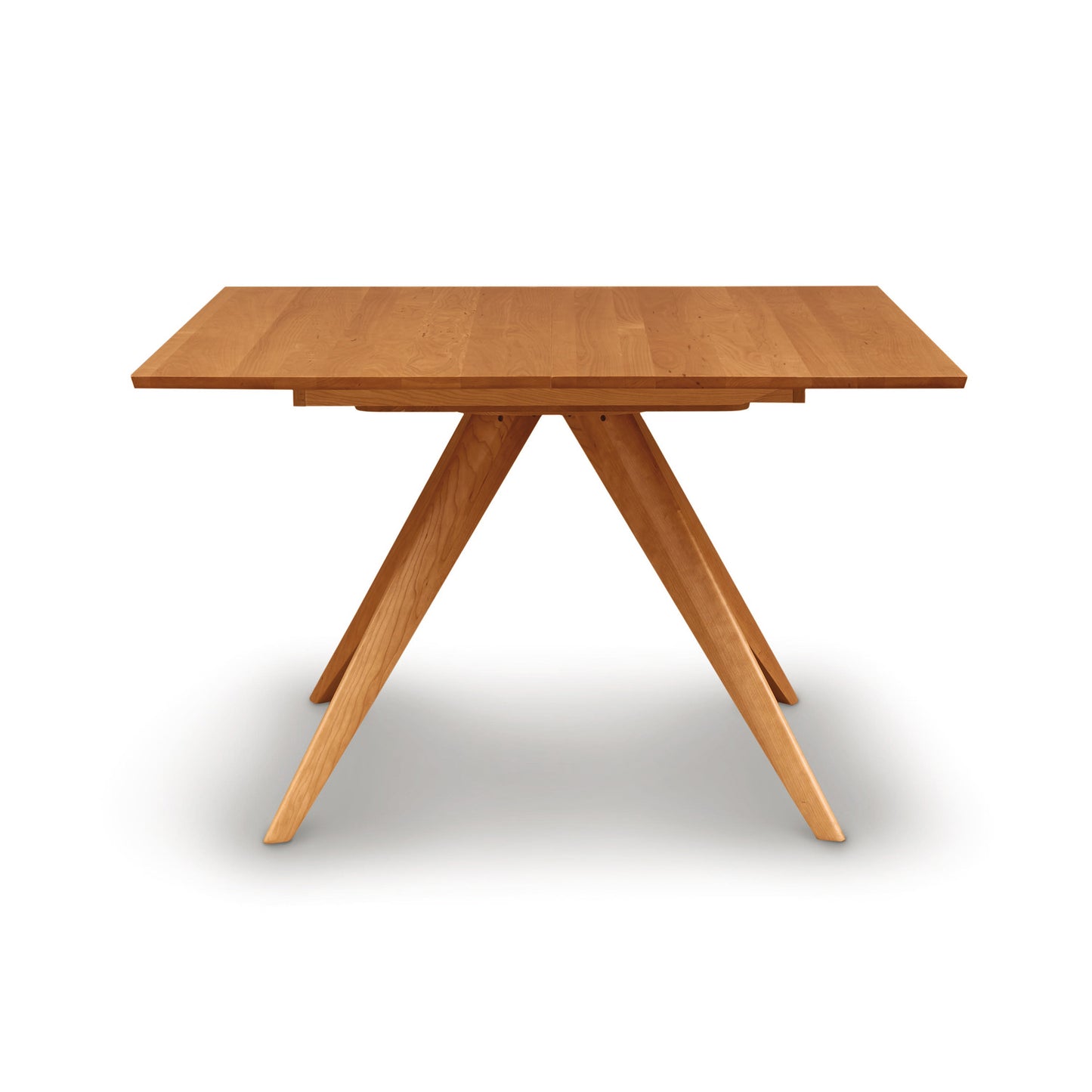 Catalina Square Extension Dining Table by Copeland Furniture, showcasing mid-century modern design and crafted from sustainably harvested wood.