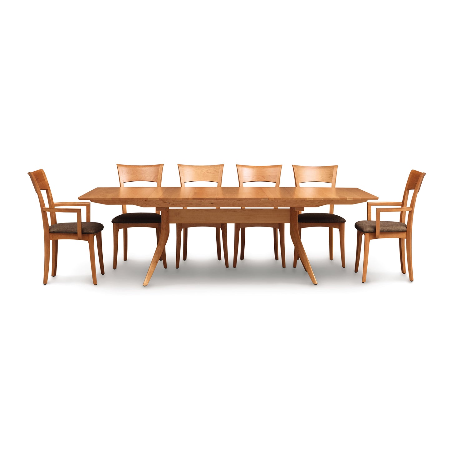 Catalina Trestle Extension Table by Copeland Furniture with six mid-century chairs featuring curved backs and dark upholstered seats, all crafted in premium wood.