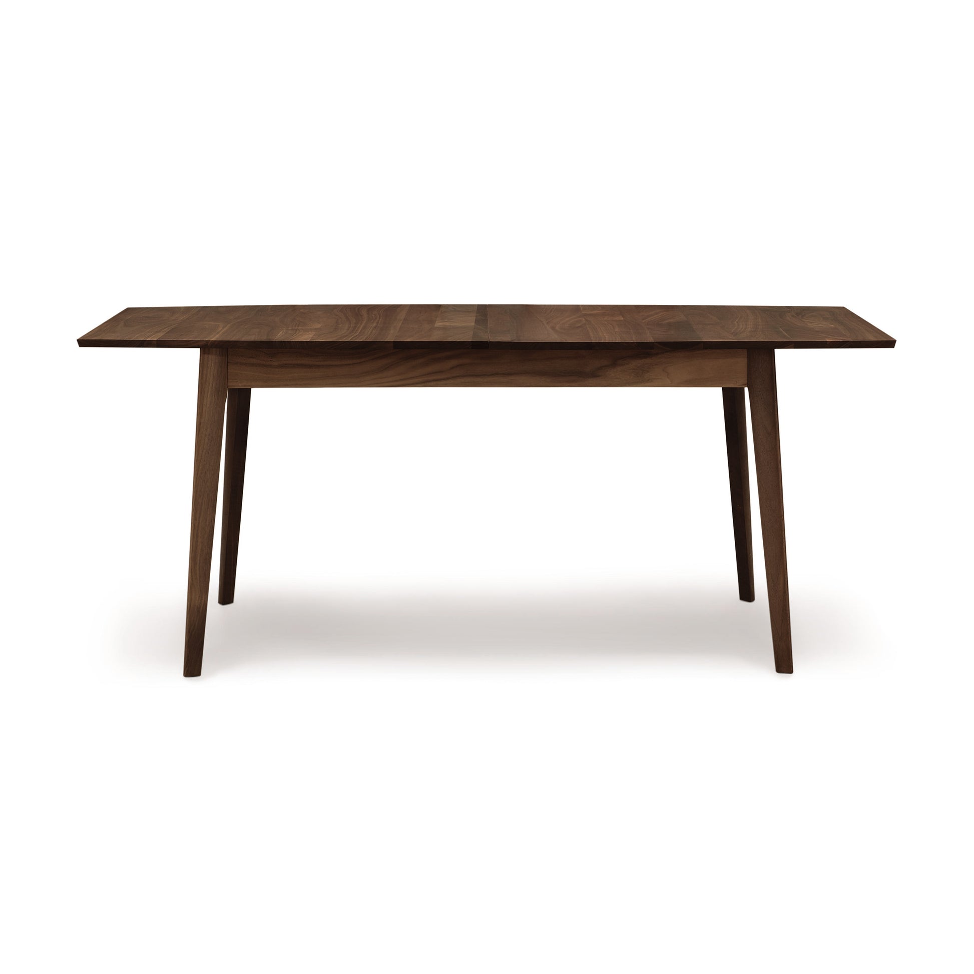 Copeland Furniture Catalina Extension Table shown in dark brown solid wood, featuring a sleek Mid-Century design with four legs.