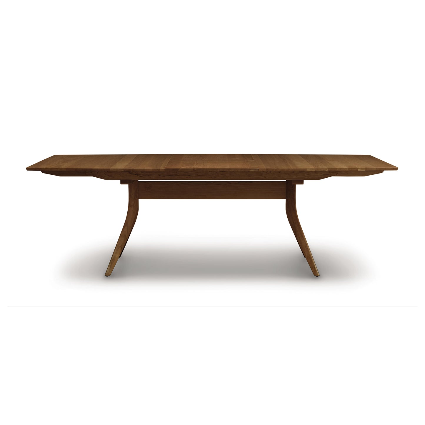 Copeland Catalina Trestle Extension Table made from solid American hardwood with angled legs and a smooth, polished top.