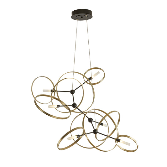 Modern Hubbardton Forge Celesse Pendant with interlocking gold rings and tubular lights, elegantly highlighting its sleek design.
