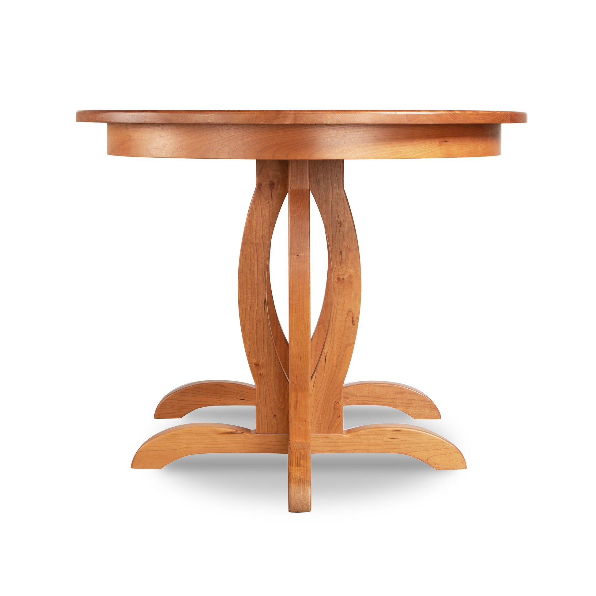 Lyndon Furniture Cherry Blossom Double Pedestal Extension Table with polished cherry wood top and elegant curved legs.