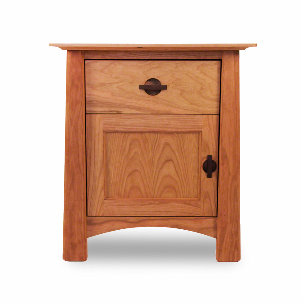 Vermont craftsman Maple Corner Woodworks Cherry Moon 1-Drawer Nightstand With Door, isolated on a white background.