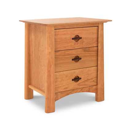 A Maple Corner Woodworks Cherry Moon 3-Drawer Nightstand in solid wood with a light brown finish, featuring rounded corners and simple, rounded pull handles. It is isolated on a white background.