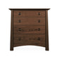 A Maple Corner Woodworks Cherry Moon 4-Drawer Chest with four evenly spaced, closed drawers, featuring round pulls on each, against a white background.