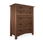 A Cherry Moon 5-Drawer Chest with a vertical design, featuring Vermont craftsmanship and round knobs on each drawer, isolated against a white background. (Maple Corner Woodworks)