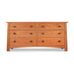 A Cherry Moon 6-Drawer Dresser crafted from sustainably harvested wood by Maple Corner Woodworks, featuring six drawers with three smaller drawers on the top row and three larger drawers below, isolated on a white background. Each drawer has a round, metal handle.